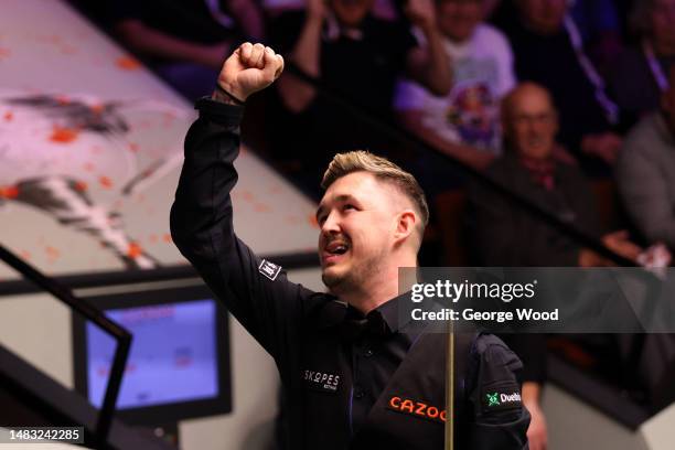 Kyren Wilson of England celebrates making a maximum 147 break during their round one match against Ryan Day of Wales on Day Five of the Cazoo World...