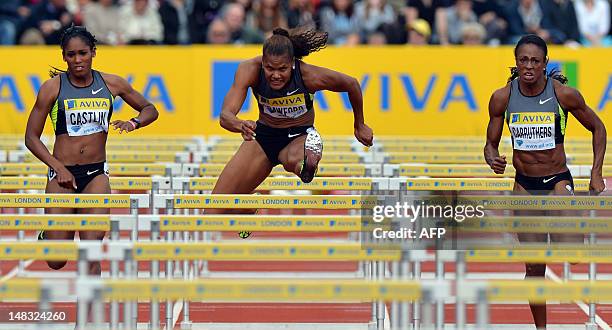 Athlete Kristi Castlin, US athlete Virginia Crawford and US athlete Danielle Carruthers compete in their women's 100m hurdles semi-final on the...