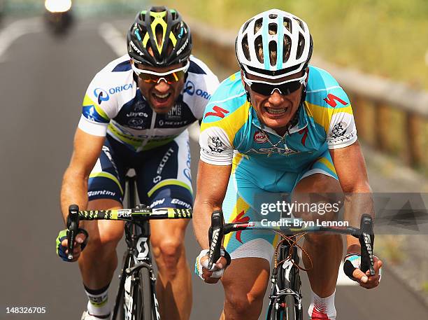 Alexandro Vinokourov of Kazachstan and the Astana Pro Team attacked with Michael Albasini of Switzerland and Orica Greenedge in the final kilometres...