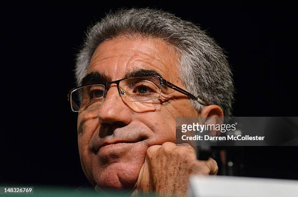 Manuel Orantes listens during a press conference prior to his induction into the International Tennis Hall Of Fame July14, 2012 in Newport, Rhode...
