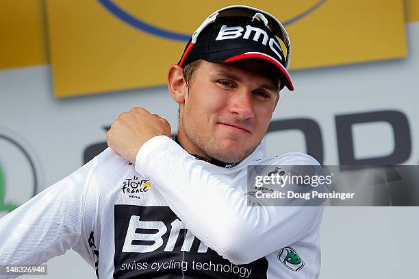 Tejay Van Garderen of the USA riding for BMC Racing takes the podium after defending the best young rider's white jersey in stage thirteen of the...