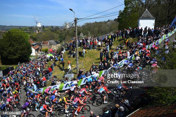 General view of the peloton climbing to the Côte de Cherav while fans cheer during the 87th La Fleche Wallonne 2023, Men's Elite a 194.3km one day...
