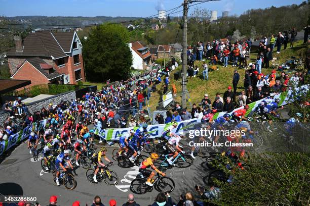 General view of the peloton climbing to the Côte de Cherav while fans cheer during the 87th La Fleche Wallonne 2023, Men's Elite a 194.3km one day...