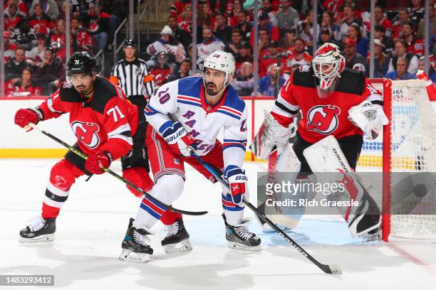 Chris Kreider of the New York Rangers in front of Vitek Vanecek of the New Jersey Devils during Game One of the First Round of the 2023 Stanley Cup...