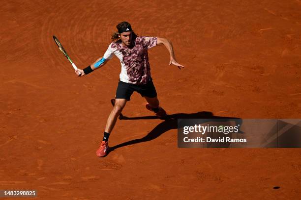 Stefanos Tsitsipas of Greece plays a forehand shot against Pedro Cachin of Argentina during the second round match on day three of the Barcelona Open...