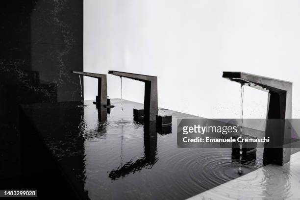 German manufacturer Grohe Spa quartz made faucets sit on display during a design exhibition at Pinacoteca di Brera, Brera district, on April 19, 2023...