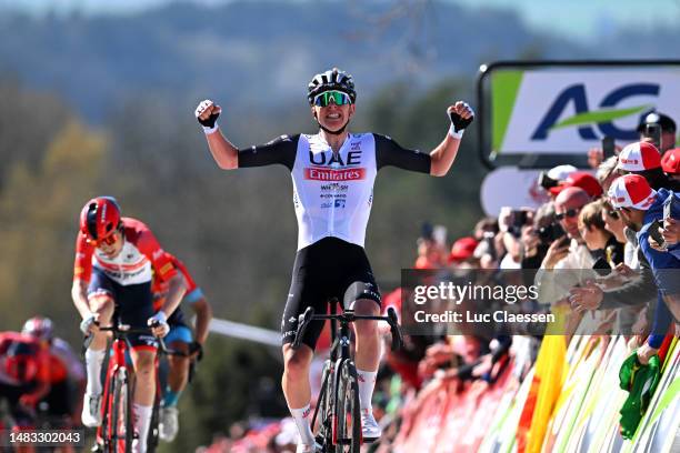 Tadej Pogačar of Slovenia and UAE Team Emirates celebrates at finish line as race winner during the 87th La Fleche Wallonne 2023, Men's Elite a...