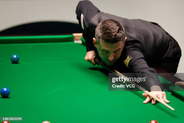 Mark Selby of England plays a shot in the first round match against Matthew Selt of England on day 5 of the 2023 Cazoo World Championship at Crucible...