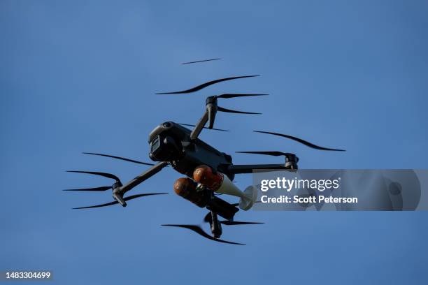 Ukrainian military drone is loaded with dummy grenades for target practice, as members of the volunteer Dnipro-1 Battalion of the Ukrainian National...