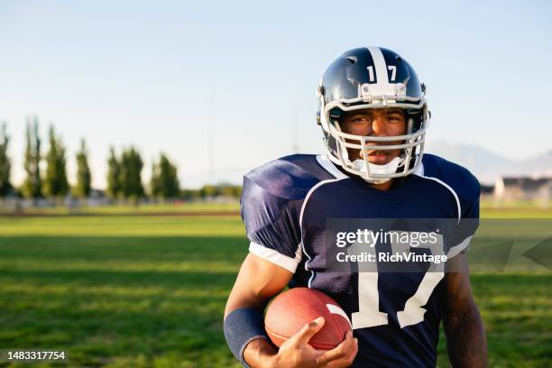 american football running back - black man running back stock pictures, royalty-free photos & images