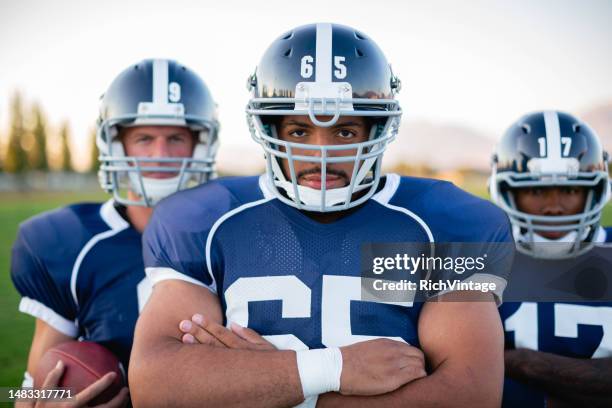 american football team - quarterback player stock pictures, royalty-free photos & images