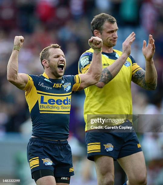 Rob Burrow and Jamie Peacock of Leeds celebrate winning the Carnegie Challenge Cup Semi Final match between Leeds Rhinos and Wigan Warriors at...