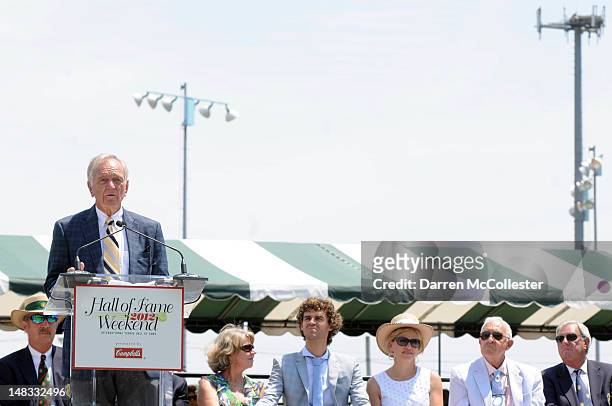 Tom Snow gives an induction speech for his son, Randy Snow, during the International Tennis Hall Of Fame induction ceremonies July14, 2012 in...