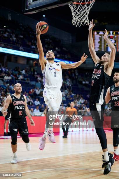 Nigel Williams-Goss of Real Madrid and Quino Colom and Dusan Miletic of Basquet Girona during ACB League match between Real Madrid and Basquet Girona...