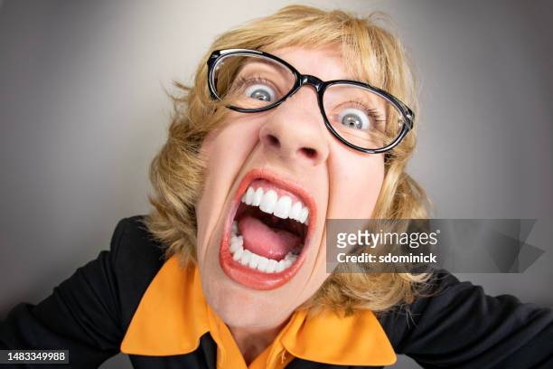 funny fisheye older woman in a fit of rage - ugly woman stock pictures, royalty-free photos & images