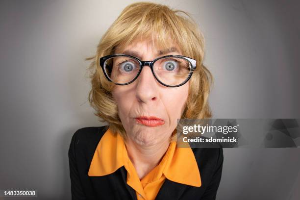 funny fisheye older woman looking confused - old ugly woman stockfoto's en -beelden