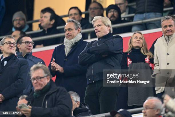 Jan-Christian Dreesen, CFO of FC Bayern Muenchen, Oliver Kahn, CEO of FC Bayern Munich look on from the stands during the UEFA Champions League...