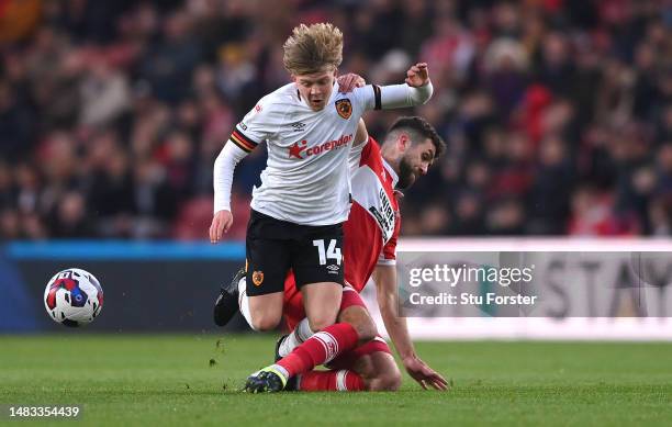 Middlesbrough player Tommy Smith challenges Harry Vaughan of Hull during the Sky Bet Championship between Middlesbrough and Hull City at Riverside...