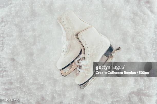 high angle view of shoes on floor,romania - ice rink no people stock pictures, royalty-free photos & images
