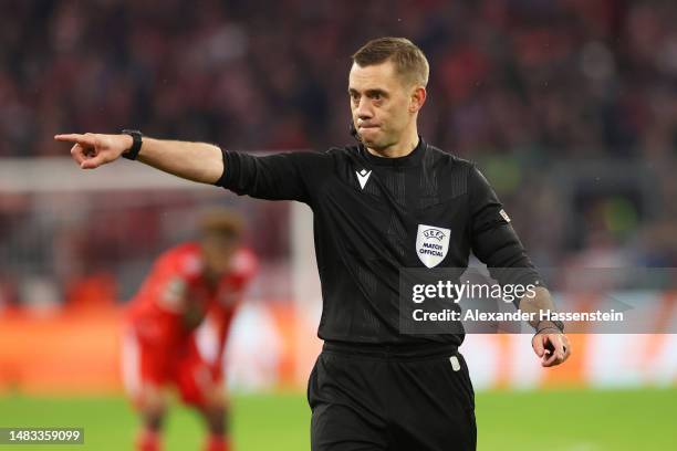 Referee Clement Turpin awards a penalty to Manchester City for handball by Dayot Upamecano of FC Bayern Munich during the UEFA Champions League...