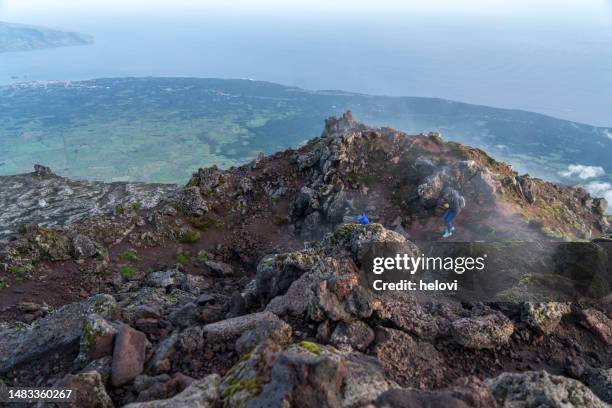 trail at sunrise on the top of volcano mt. pico - pico azores stockfoto's en -beelden