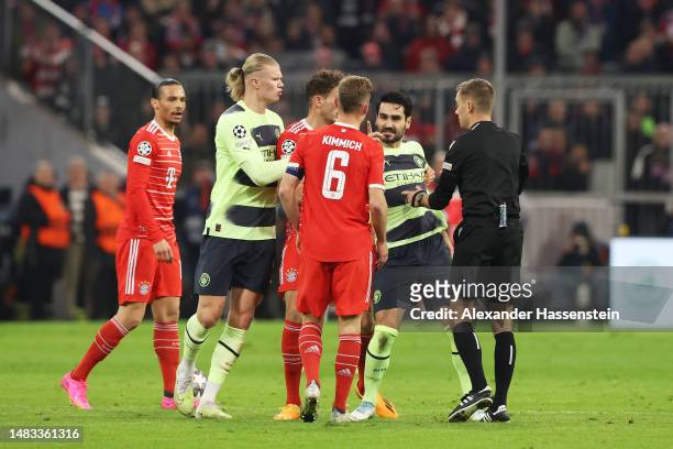 Ilkay Guendogan of Manchester City clashes with Joshua Kimmich of FC Bayern Munich as Referee Clement Turpin steps in during the UEFA Champions...