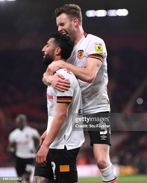 Allahyar Sayyad of Hull celebrates after scoring the first goal with team mate Callum Elder during the Sky Bet Championship between Middlesbrough and...