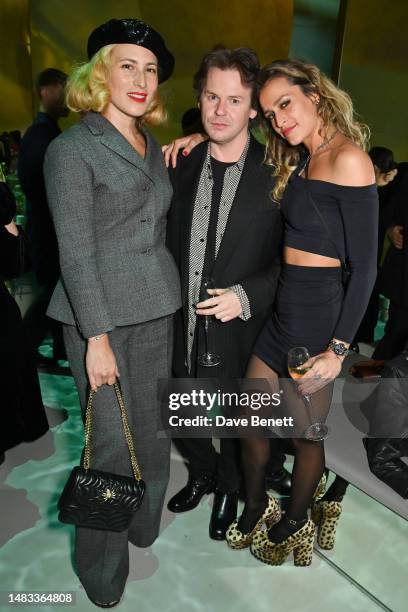 Charlotte Dellal, Christopher Kane and Alice Dellal attend the La Mer heritage dinner at Frameless, Marble Arch Place on April 19, 2023 in London,...