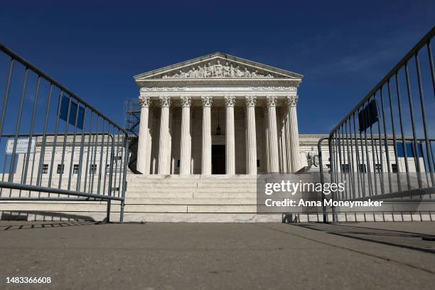 Temporary security fences align along a path to the plaza of the U.S. Supreme Court Building on April 19, 2023 in Washington, DC. Today U.S. Supreme...