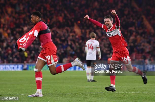 Middlesbrough player Chuba Akpom celebrates with Jonny Howson after scoring the third Boro goal during the Sky Bet Championship between Middlesbrough...