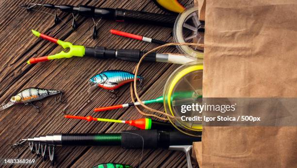 top view paper bag with fishing essentials - fishing bait stock pictures, royalty-free photos & images