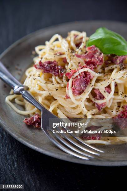 close-up of pasta in plate on table,romania - fettuccine bildbanksfoton och bilder