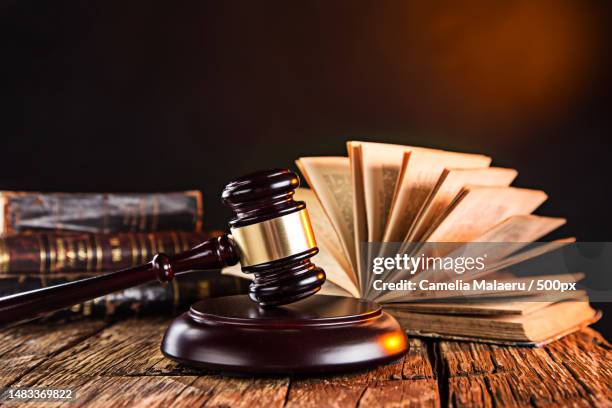 wooden gavel and books on wooden table,law concept - straff juridik bildbanksfoton och bilder