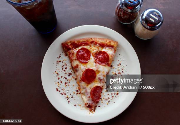 high angle view of breakfast served on table - pepperoni pizza overhead stock-fotos und bilder
