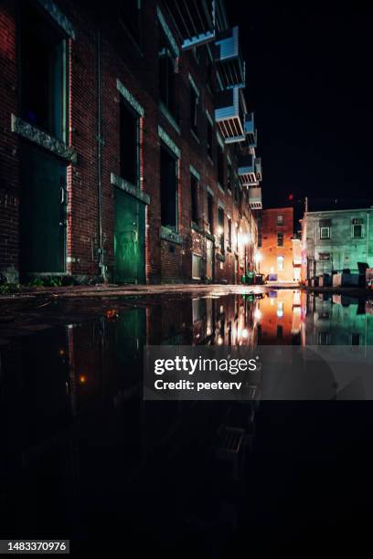 dark alley reflection in old port of portland, maine - portland maine stock pictures, royalty-free photos & images