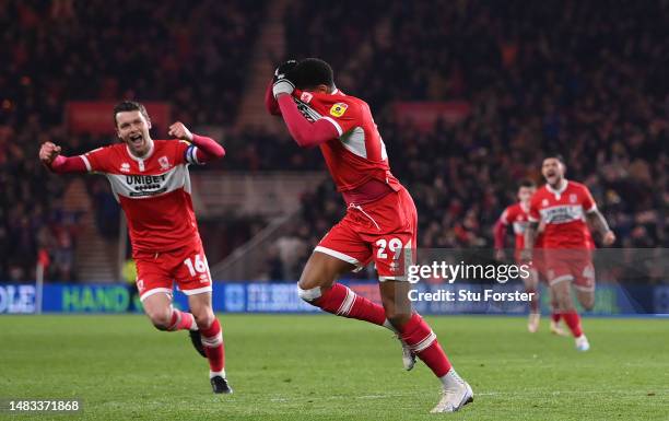 Middlesbrough player Chuba Akpom celebrates with Jonny Howson after scoring the third Boro goal during the Sky Bet Championship between Middlesbrough...