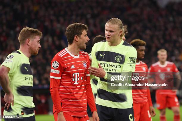 Erling Haaland of Manchester City reacts towards Thomas Mueller of FC Bayern Munich during the UEFA Champions League quarterfinal second leg match...