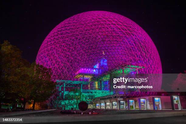 biodome of montreal by night. - montreal biodome stock pictures, royalty-free photos & images