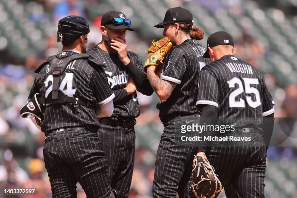 Pitching coach Ethan Katz of the Chicago White Sox talks with Mike Clevinger during the third inning against the Philadelphia Phillies at Guaranteed...