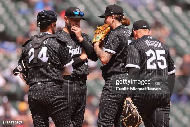 Pitching coach Ethan Katz of the Chicago White Sox talks with Mike Clevinger during the third inning against the Philadelphia Phillies at Guaranteed...