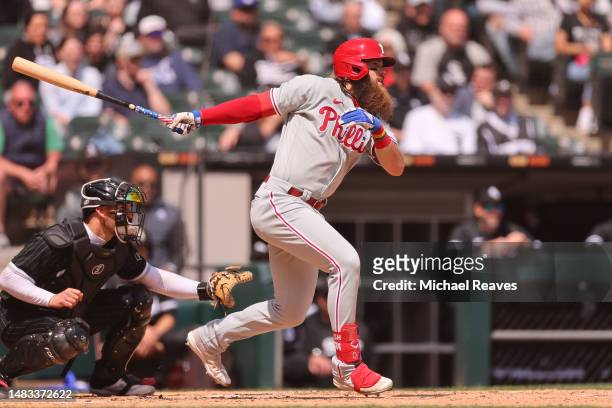 Brandon Marsh of the Philadelphia Phillies singles during the third inning against the Chicago White Sox at Guaranteed Rate Field on April 19, 2023...