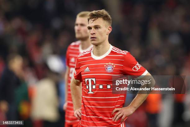 Joshua Kimmich of FC Bayern Munich looks dejected after their side's elimination from the UEFA Champions League after the UEFA Champions League...