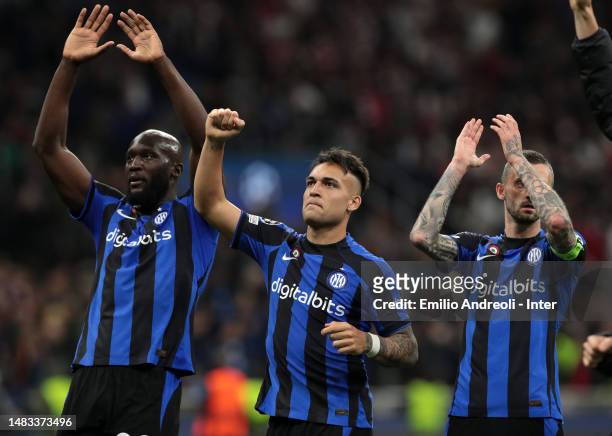 Romelu Lukaku, Lautaro Martinez and Marcelo Brozovic of FC Internazionale celebrate the victory at the end of the UEFA Champions League quarterfinal...