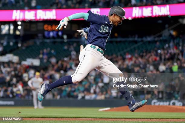 Julio Rodriguez of the Seattle Mariners celebrates his two-run home run against the Milwaukee Brewers during the second inning at T-Mobile Park on...