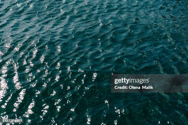 blue lake water with waves background - ocean texture stock pictures, royalty-free photos & images