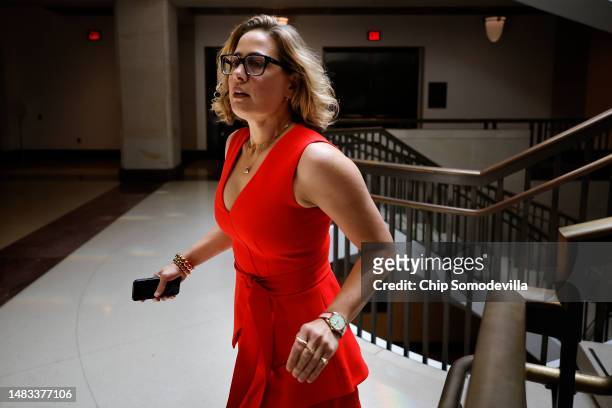Sen. Kyrsten Sinema arrives for a closed-door briefing by intelligence officials about the Discord leaks at the U.S. Capitol Visitors Center on April...