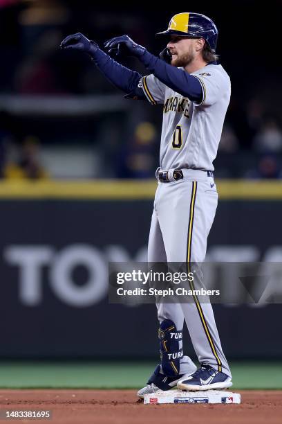 Brice Turang of the Milwaukee Brewers celebrates his two-run RBI double against the Seattle Mariners during the seventh inning at T-Mobile Park on...