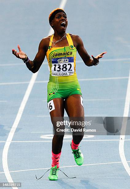 Janieve Russell of Jamaica wins the Women's 400 metres Hurdles Final on the day five of the 14th IAAF World Junior Championships at Estadi Olimpic...