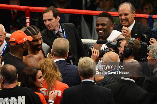 David Haye pays his respects to Dereck Chisora after their heavyweight fight at The Boleyn Ground on July 14, 2012 in London, England.