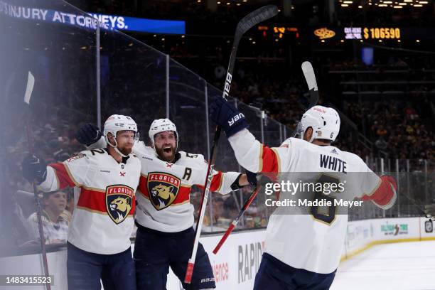 Eric Staal of the Florida Panthers celebrates with Aaron Ekblad and Colin White after scoring against the Boston Bruins during the second period of...